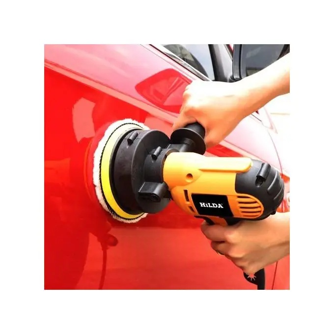 Man applying easy-to-use car wax sealant by hand to car bonnet for brilliant shine.