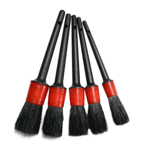 5-piece car detailing brush set for deep cleaning interior vents, wheels, and exterior emblems.
