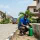 Pest control expert applying termite prevention treatmen